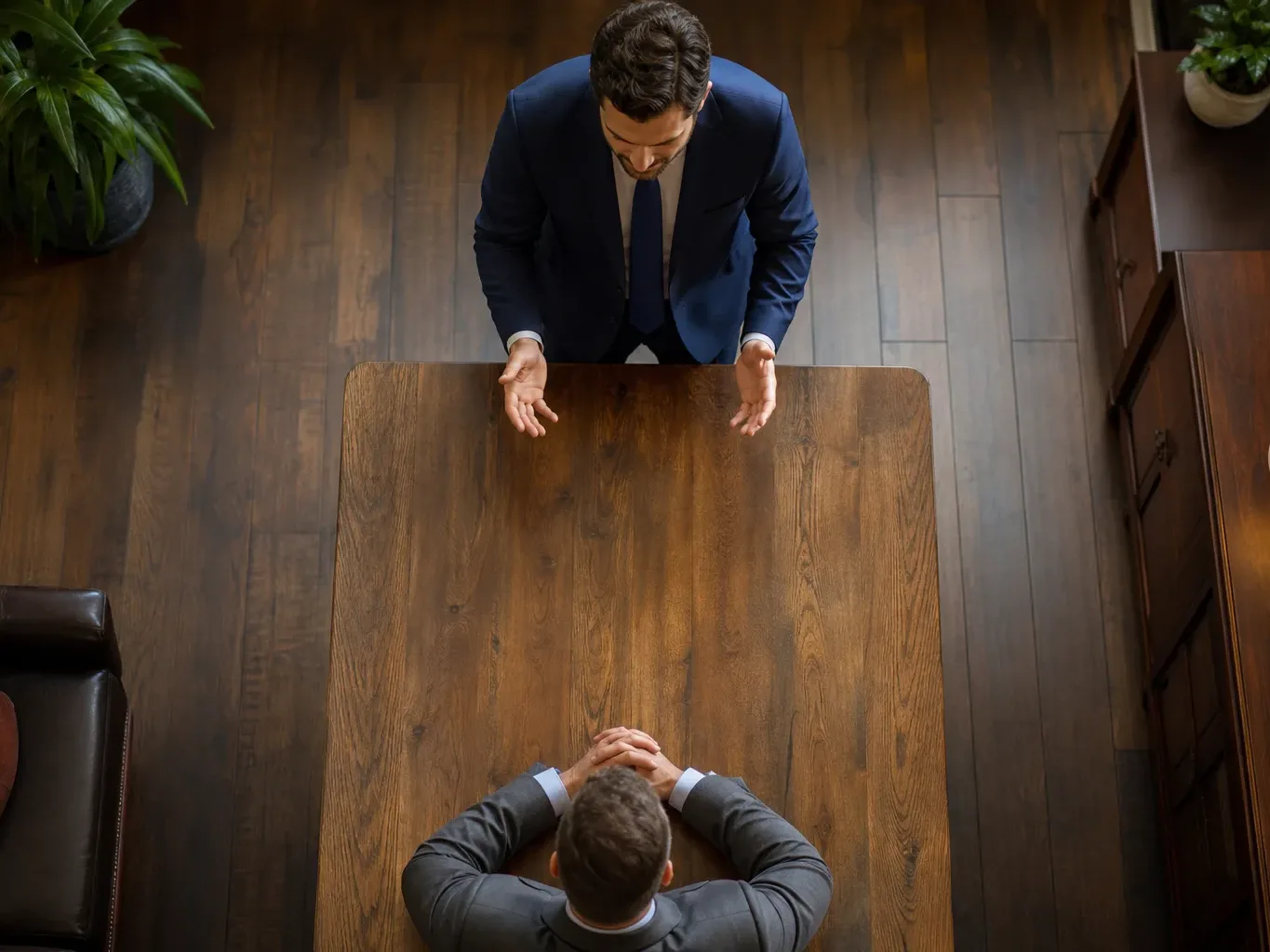An Idaho Falls attorney negotiates settlement terms with an insurer on behalf of a client